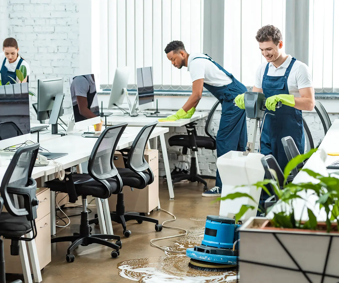 1 Office cleaning staff working with equipment.