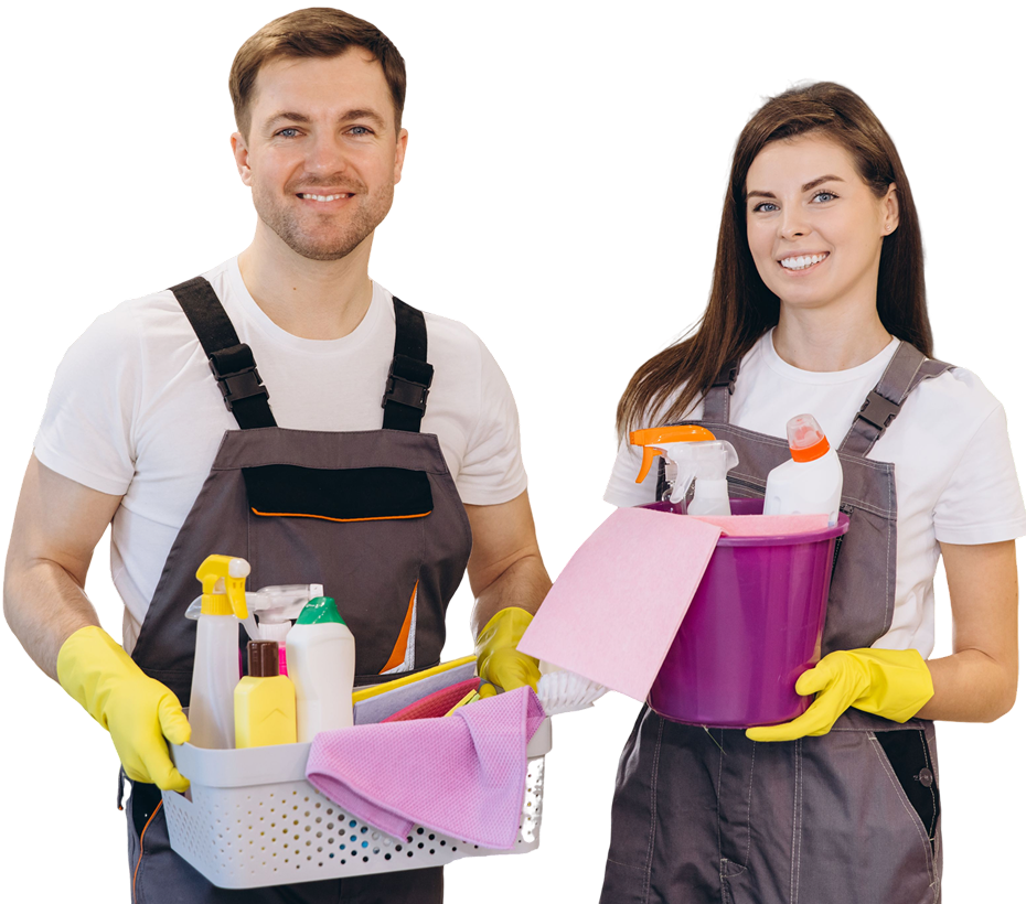 Two cleaners holding cleaning supplies, smiling.